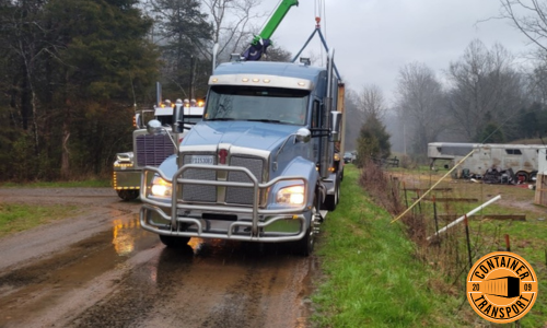 Loading Container on a trailer.