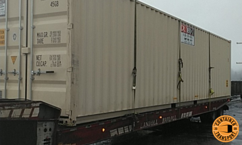 Transporting Container on a trailer.