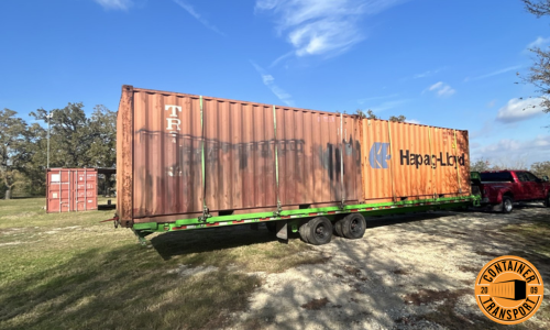 Container on a fifth wheel trailer transport.